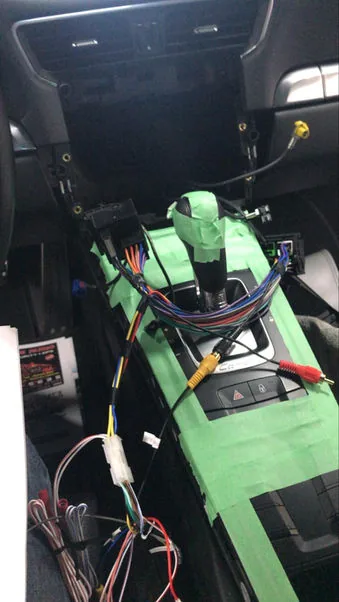 Vehicle wiring exposed during a Conexion security system installation
